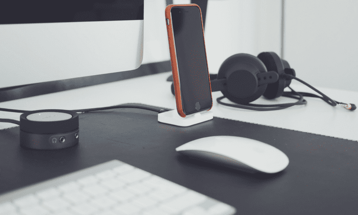 desk, computer, iphone, headphones