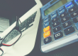 laptop, glasses, and calculator